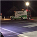 Ambulance in parking lot at night