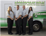 EMS staff in front of ambulance