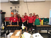 EMS staff members cooking for pancake feed