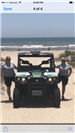 EMS staff with ATV parked on the beach