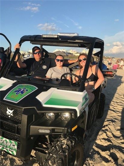 EMS staff in ATV on the beach