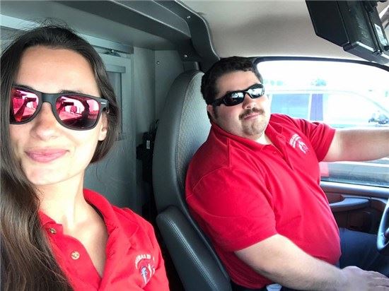 EMS staff members driving an ambulance