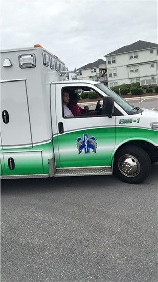 EMS staff riding in an ambulance