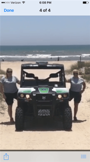 EMS staff with ATV parked on the beach